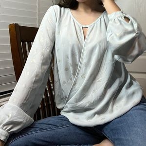 Blue and gold blouse.